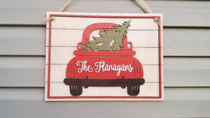 Wood sign with christmas truck